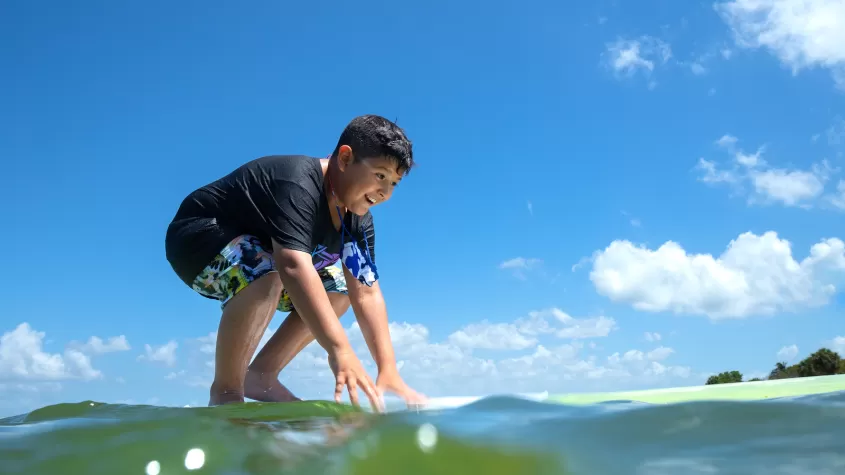 boy on surfboard