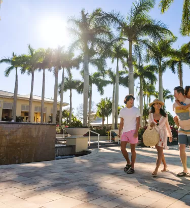 Family Walking Outside Hyatt Regency Coconut Point Resort & Spa
