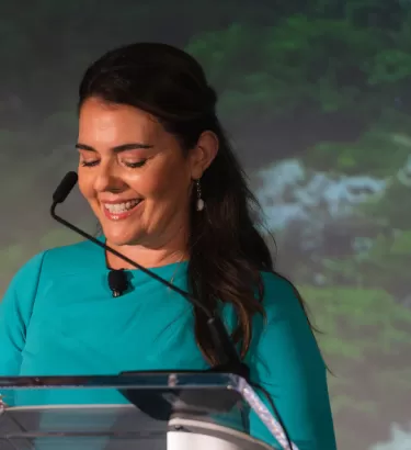 women presenting on stage
