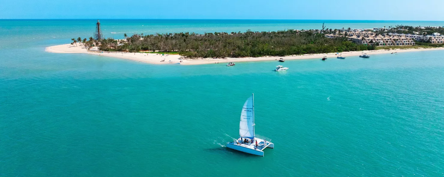 A sailboat sails near award-winning Sanibel Island